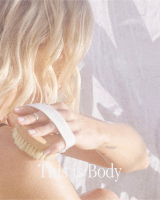 This is body, girl massaging with body brush
